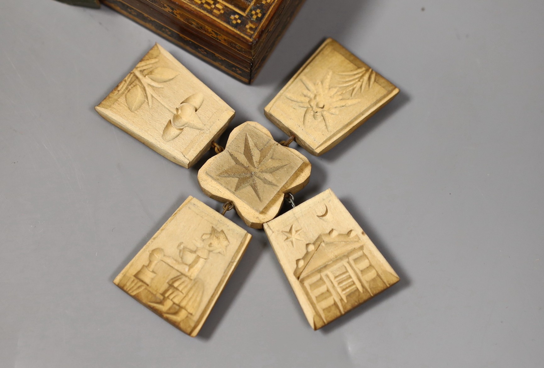 A 19th century Swiss oil on panel, a Tunbridgeware box and paperknife and other wood wares